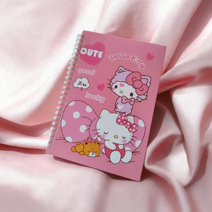 12 Libretas Kitty espiral $15 c/u