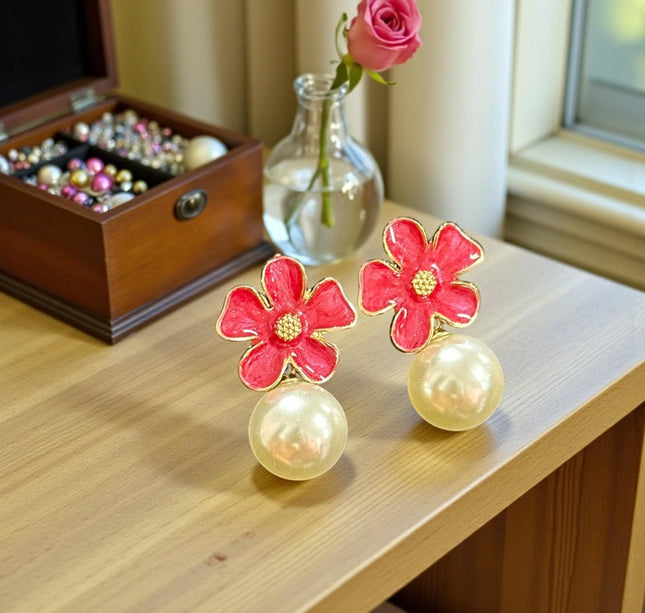 12 Pares de Aretes Flor con Perlita $7.5 c/u