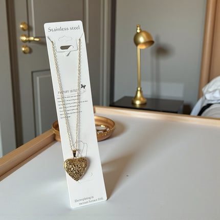 12 Collares Relicarios de Corazón Acero Inoxidable $29.05 c/u