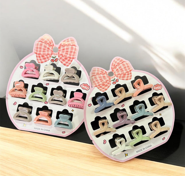 12 Sets de 10 pincitas para Cabello Figuras $12.5 c/u