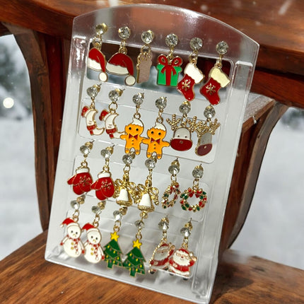 12 Pares de Aretes Navideños Colgantes $6.25 c/u