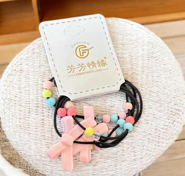 12 Sets de Ligas para Cabello Decoradas $5.9 c/u