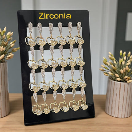 12 Aretes Dorados Pedreria Zirconia Corazon $17.7 c/u