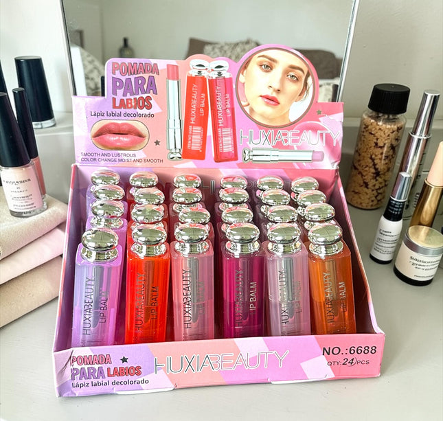 12 Balsamo Labial Huxia Beauty $13 c/u