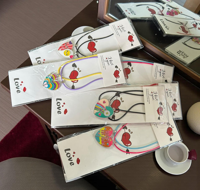 12 Collares Corazones Parejas "Love" con IMÁN $15 c/u