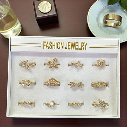 12 Anillos Dorados Figuras con Pedreria $5.7 c/u