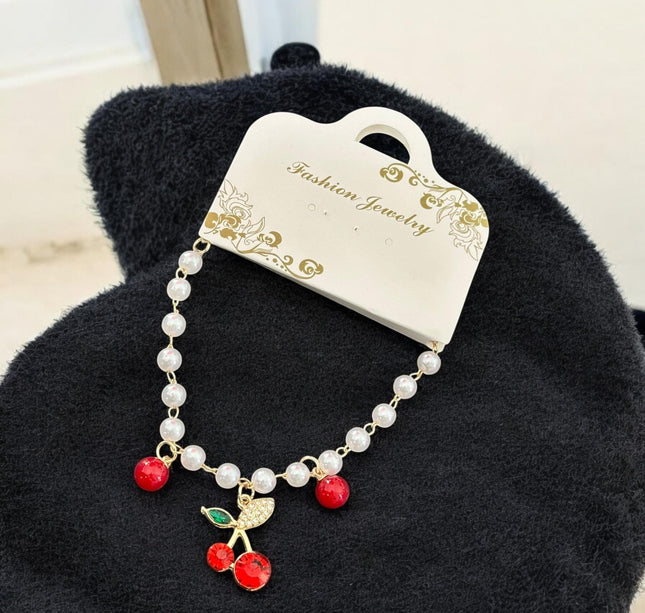 12 Pulseras Cherry con Dije, Perlas $12 c/u