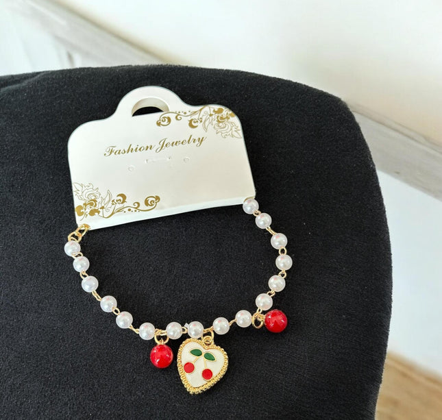 12 Pulseras Cherry con Dije, Perlas $12 c/u