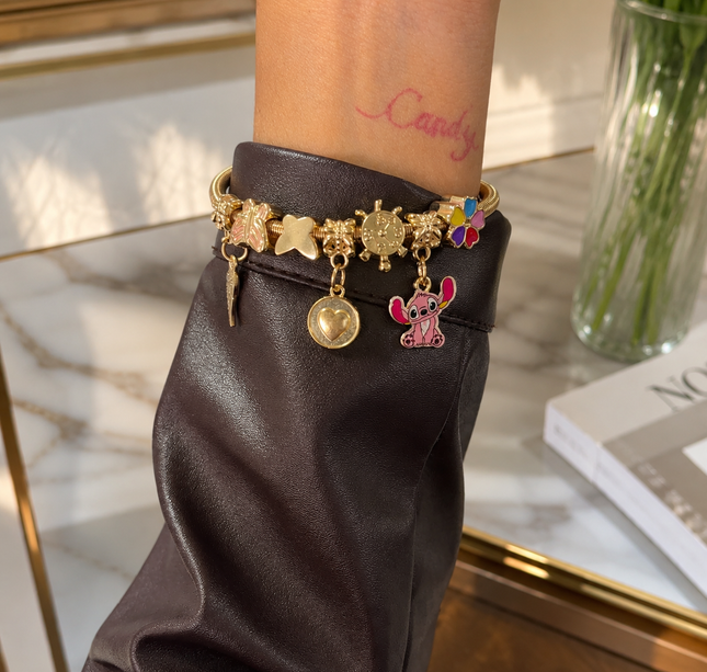 12 Pulsera Tipo Pandora Sticht con Dijes $12.9 c/u
