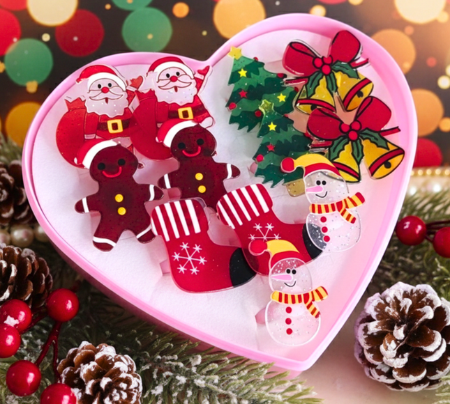 Estuche corazon con 12 Anillos Navideños $3.9 c/u