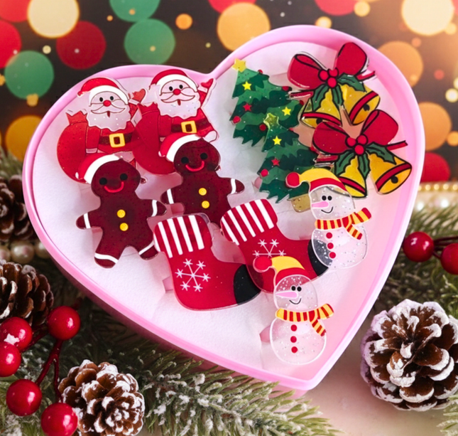 Estuche corazon con 12 Anillos Navideños $3.9 c/u