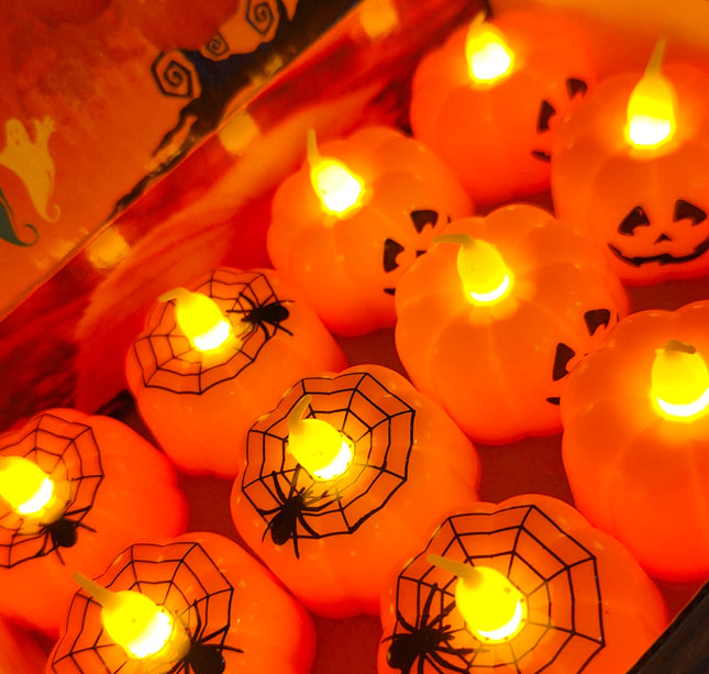 12 Velas calabacita con Luz $8.3 c/u