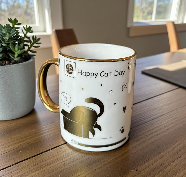 3 Taza "Happy Cat Day" Dorada $32 c/u
