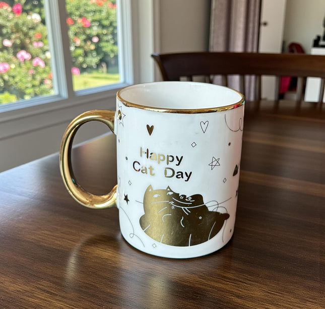 3 Taza "Happy Cat Day" Dorada $32 c/u