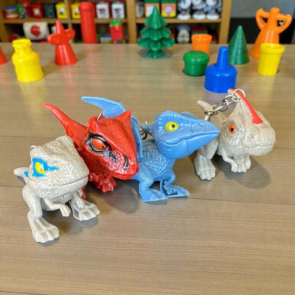 12 Llaveros Dinosaurios Mordelones $10.2 c/u