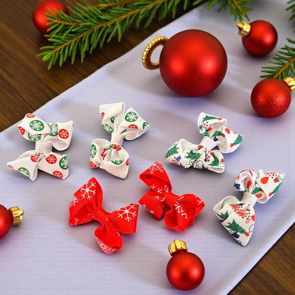 12 Pares de moñitos Santa Navideños $5.6 c/u