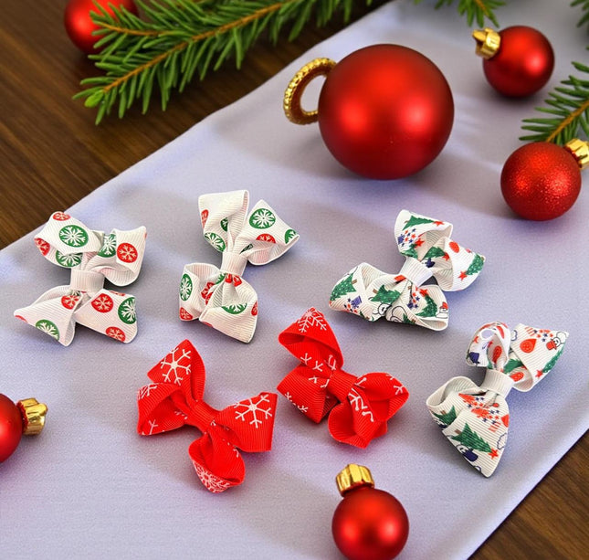 12 Pares de moñitos Santa Navideños $5.6 c/u