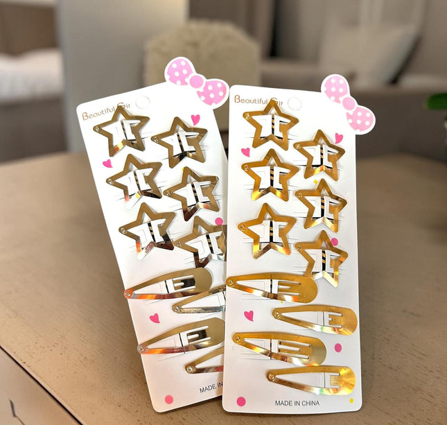 12 Sets de 6 Estrellas y 4 Pasadores Dorado/Plateado $10 c/u