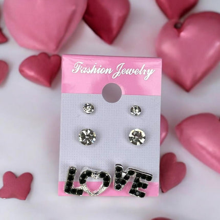 12 Sets de 3 Pares de Aretes Love $7.8 c/u