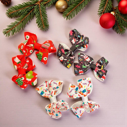 12 Pares de moñitos Santa Navideños $5.6 c/u