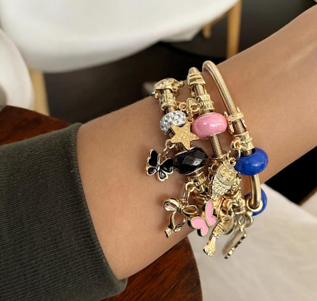 12 Pulseras tipo Pandora con Dijes de figuras $11.58 c/u