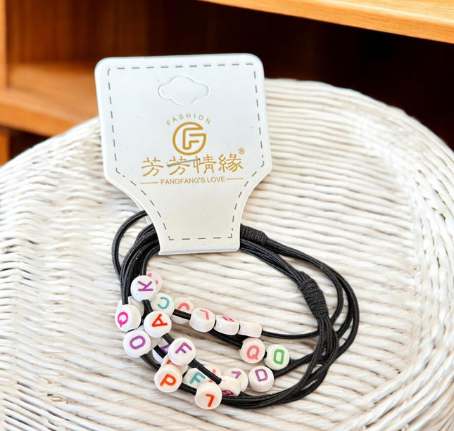 12 Sets de Ligas para Cabello Decoradas $5.9 c/u