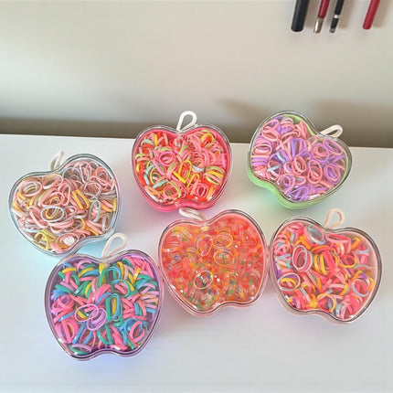 12 Estuches Manzanas con Ligas para Cabello de Colores $9.9 c/u