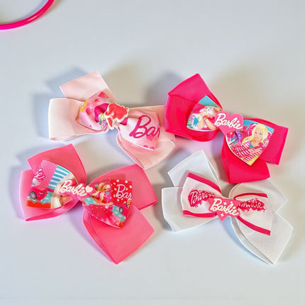 12 Moños Dobles Barbie con Figura 3D $ 7.08 c/u