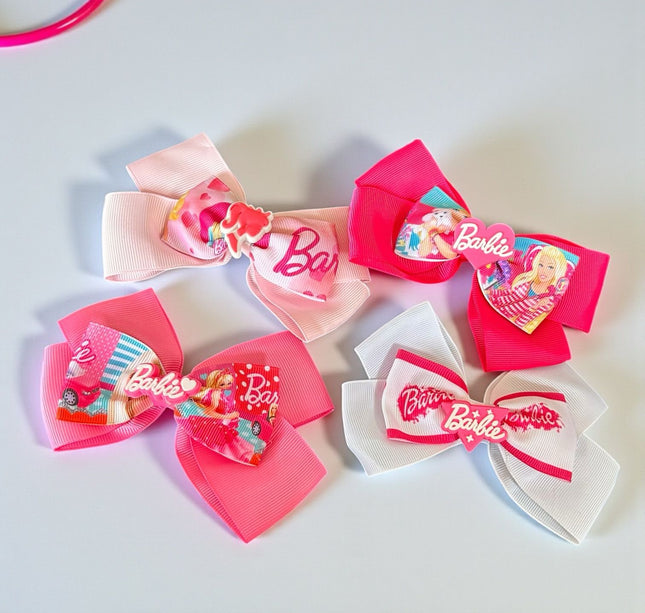 12 Moños Dobles Barbie con Figura 3D $ 7.08 c/u