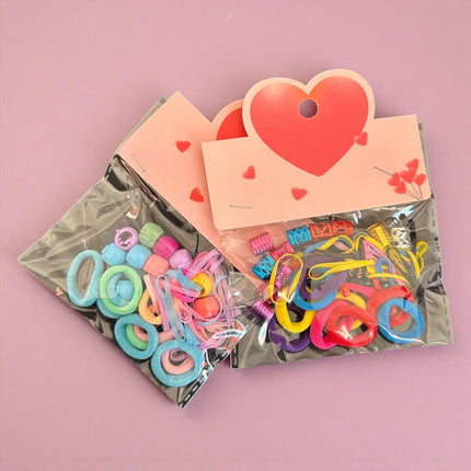12 Sets de Accesorios para Cabello "Corazon" $5.9 c/u