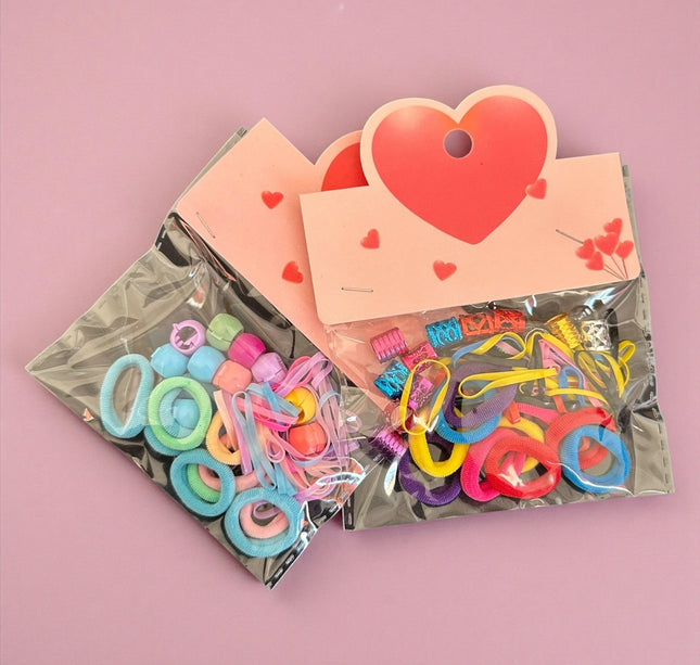 12 Sets de Accesorios para Cabello "Corazon" $5.9 c/u