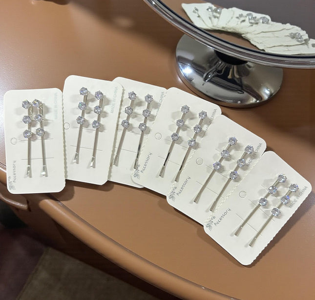 12 Pares de Pasadores Plateados con Pedrería $8.25 c/u