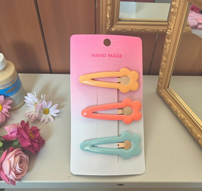 12 Sets de Cucas Flor Colores $8.9 c/u