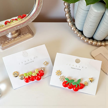 12 Sets Aretes Cherry y Pedreria $6.5 c/u