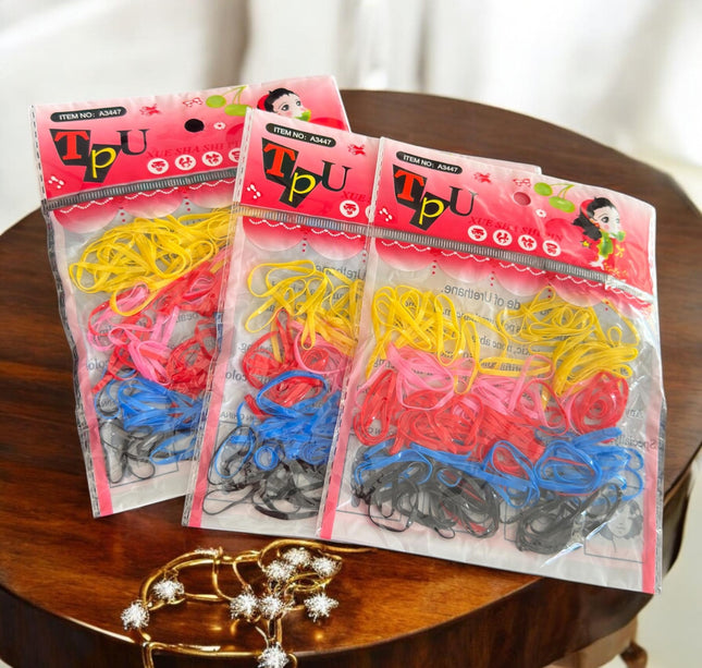 12 Bolsas de Ligas Latex para Cabello de colores $3.3 c/u