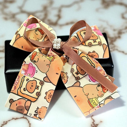 12 Moños Capibaras con Brillos $7.5 c/u