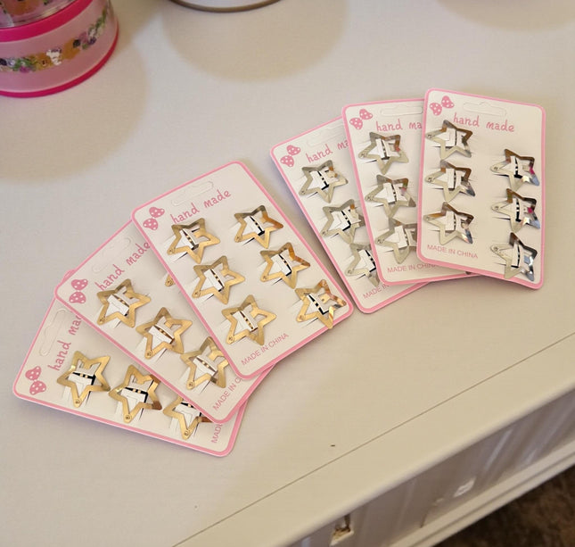 12 Sets de 6 Estrellas Cuquitas-Pasadores Doradas/Plateadas $9 c/u