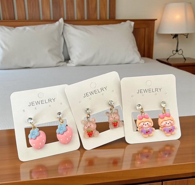 12 Pares de aretes luce hermosa $7.8 c/u