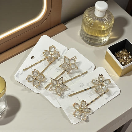 12 Pares de Pasadores Dorados con Pedrería $8.6 c/u