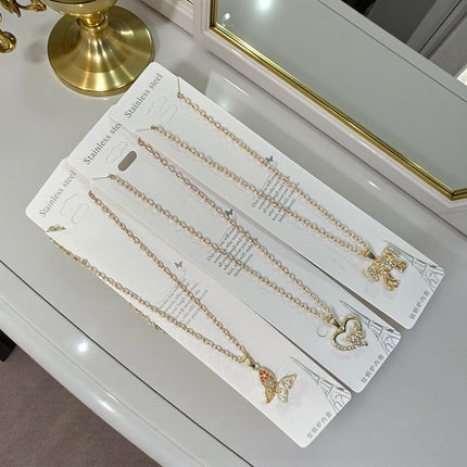 12 Collar Acero Inoxidable Figuras con Pedreria Dorado/Plateado $10 c/u