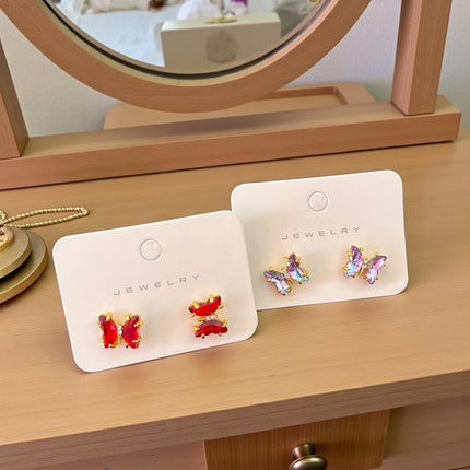 12 Aretes Mariposa Linda Tornasol Colores $12.92 c/u