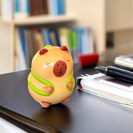 12 Squishies capibaras G $13.5 c/u