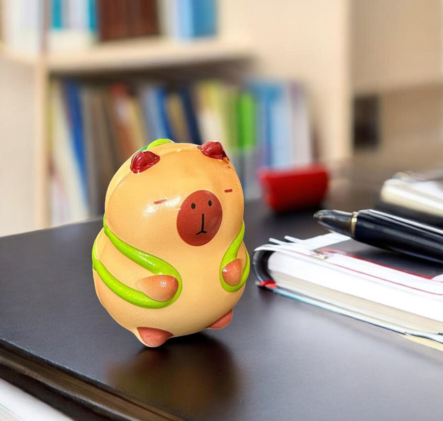 12 Squishies capibaras G $13.5 c/u