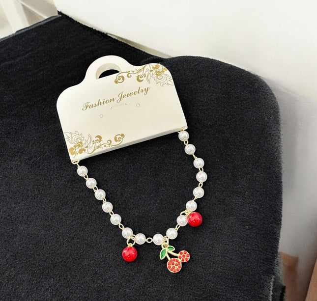12 Pulseras Cherry con Dije, Perlas $12 c/u