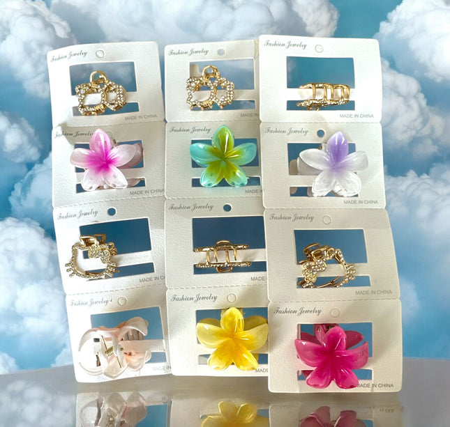 12 Pincitas para Cabello Sanrio/Flor $6.5 c/u