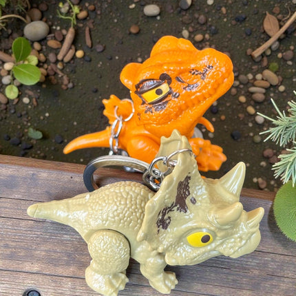 12 Llaveros Dinosaurios Mordelones $10.2 c/u