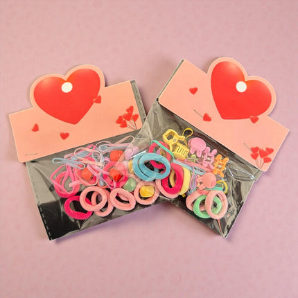 12 Sets de Accesorios para Cabello "Corazon" $5.9 c/u