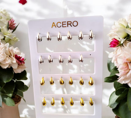 12 Aretes de acero inoixidable $8.25 c/u