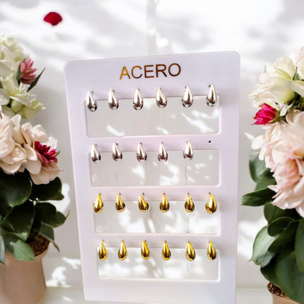 12 Aretes de acero inoixidable $8.25 c/u