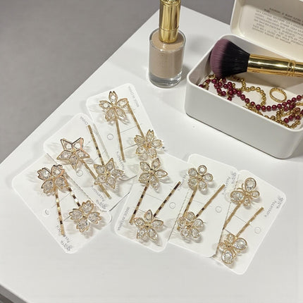 12 Pares de Pasadores Dorados con Pedrería $8.6 c/u